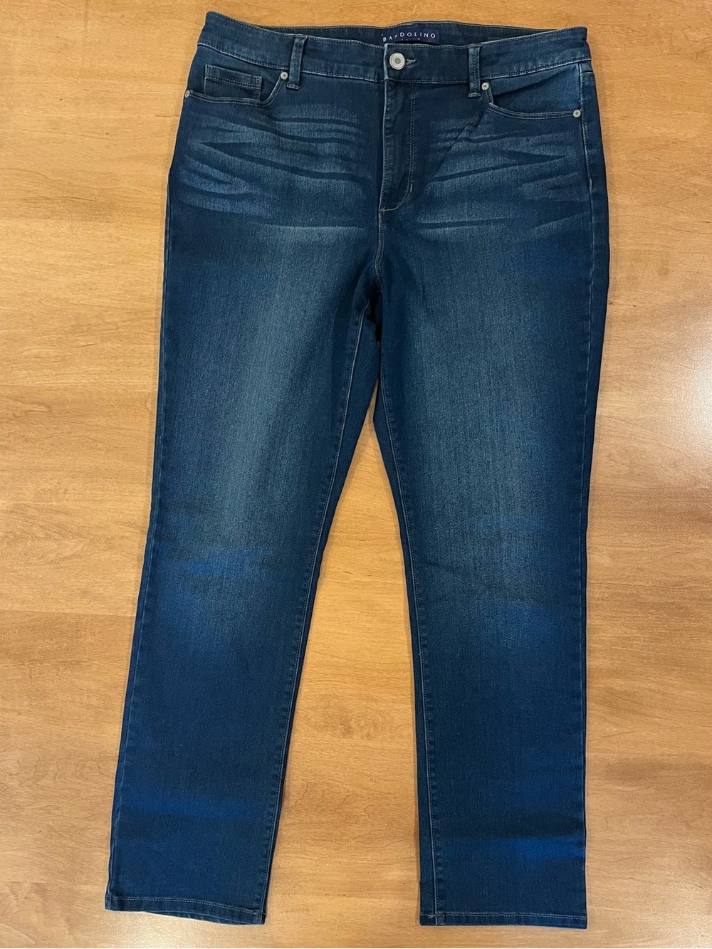Dark indigo wash high-rise jeans with withering at hips…by Bandolino (style=Amy)